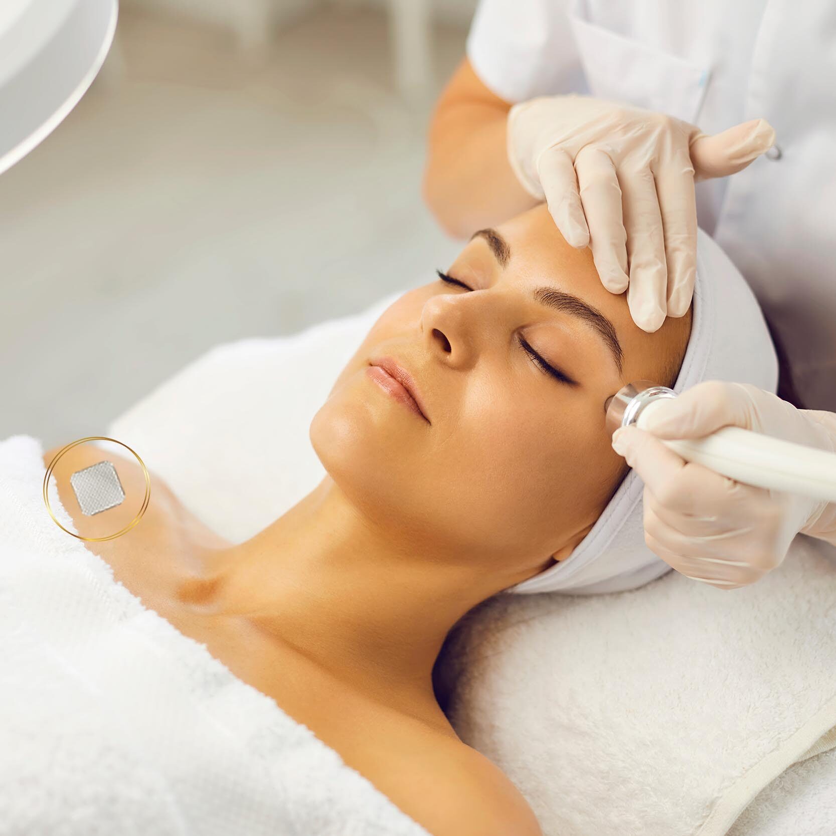 Relaxed young woman with eyes closed getting procedure of vacuum facial cleaning from cosmetologist in gloves in beauty spa salon. Facial treatment, skincare, cosmetology concept